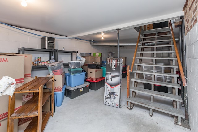 basement featuring concrete block wall