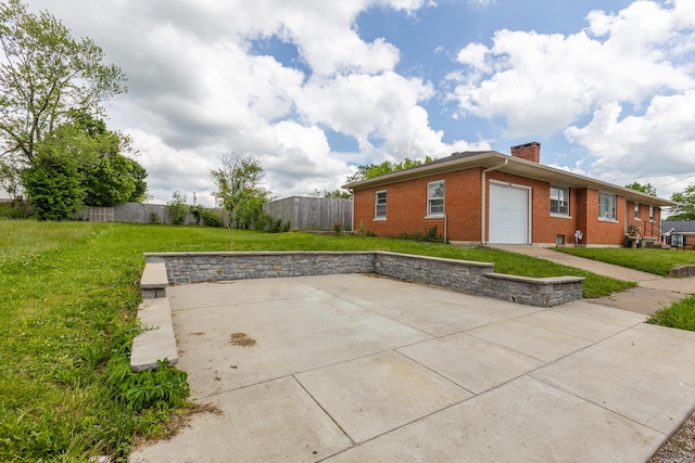 view of patio with a garage