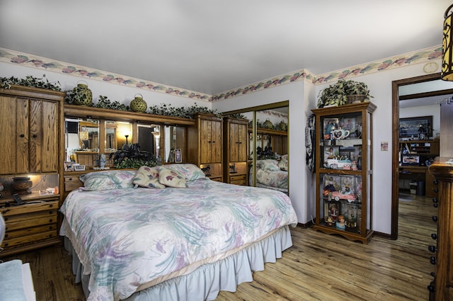 424 Woodcrest Pl, Lexington, KY 40517 - bedroom with hardwood / wood-style flooring and a closet