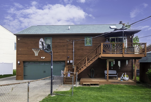 424 Woodcrest Pl, Lexington, KY 40517 - rear view of property featuring a wooden deck, concrete driveway, a garage, and a shingled roof