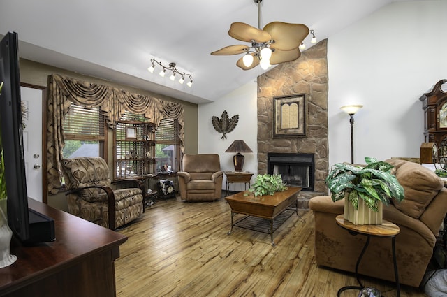 424 Woodcrest Pl, Lexington, KY 40517 - living room featuring lofted ceiling, hardwood / wood-style flooring, a fireplace, and a ceiling fan