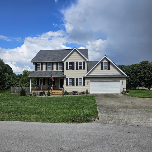 462 New Shiner Hill Rd, Williamsburg, KY 40769 - colonial-style house with a porch, driveway, a front yard, and a shingled roof