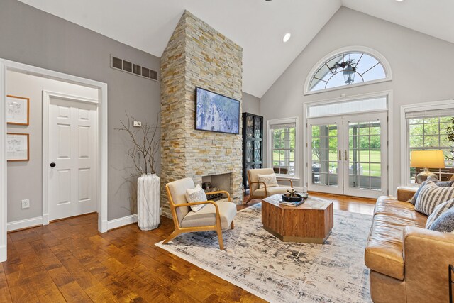 1342 Sugar Maple Ln, Lexington, KY 40511 - living area featuring high vaulted ceiling, wood finished floors, a fireplace, baseboards, and french doors