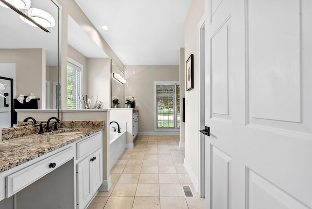 2221 Broadhead Pl, Lexington, KY 40515 - bathroom with a bath, vanity, baseboards, and tile patterned floors