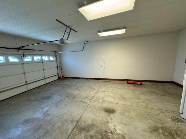 101 Megan Ct, Somerset, KY 42503 - garage with a garage door opener and baseboards
