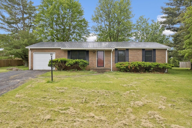 single story home with an attached garage, driveway, and brick siding