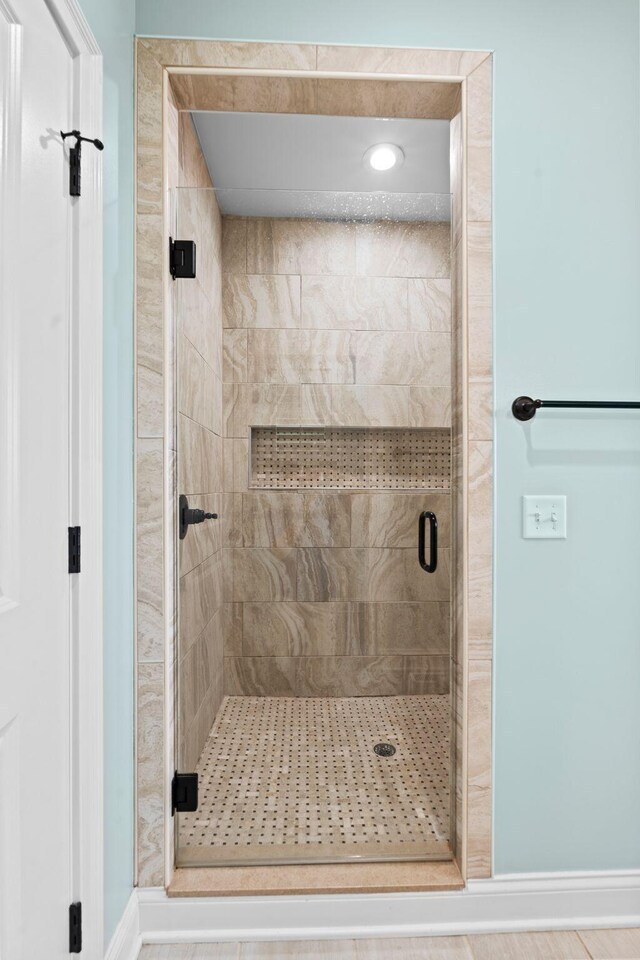 6031 Old S Dr, Richmond, KY 40475 - bathroom featuring a stall shower and baseboards