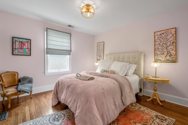 269 S Hanover Ave, Lexington, KY 40502 - bedroom with baseboards and wood finished floors