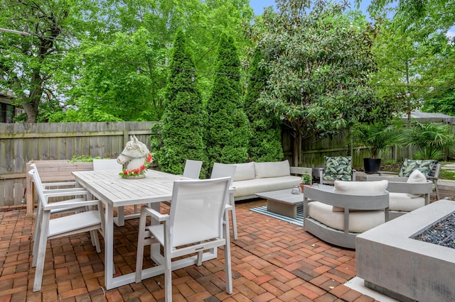 269 S Hanover Ave, Lexington, KY 40502 - view of patio / terrace with an outdoor living space, a fenced backyard, and outdoor dining space