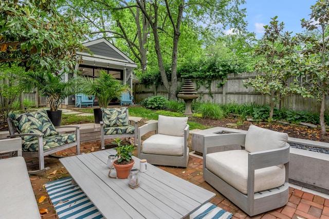 269 S Hanover Ave, Lexington, KY 40502 - view of patio with an outdoor living space with a fire pit and a fenced backyard