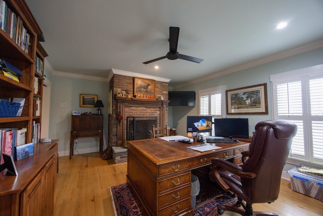 215 Bradley Ln, Lexington, KY 40511 - home office featuring ceiling fan, light wood-style floors, a brick fireplace, crown molding, and recessed lighting