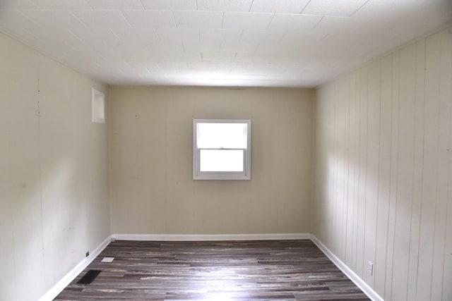 605 Prospect St, Berea, KY 40403 - unfurnished room with dark wood-style flooring and baseboards