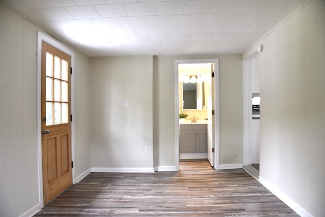 605 Prospect St, Berea, KY 40403 - entryway with wood finished floors, baseboards, and wooden walls