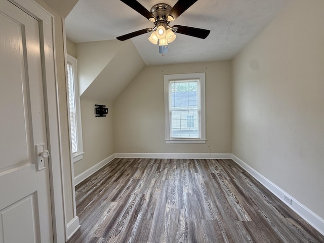 605 Prospect St, Berea, KY 40403 - additional living space featuring dark wood-type flooring, ceiling fan, baseboards, and lofted ceiling