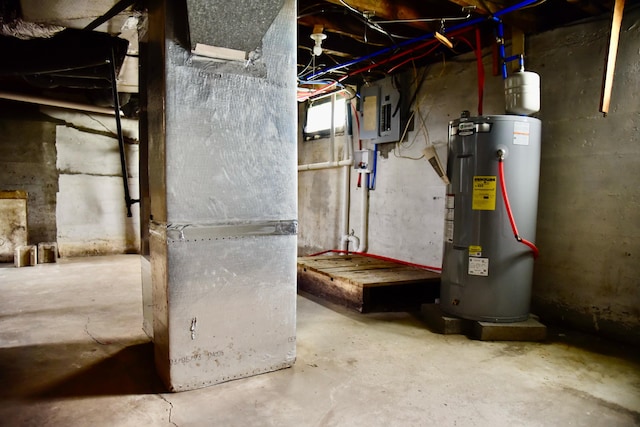 605 Prospect St, Berea, KY 40403 - utility room featuring electric water heater, electric panel, and heating unit