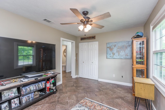 387 W Ila Ave, Danville, KY 40422 - living area with ceiling fan, plenty of natural light, and baseboards