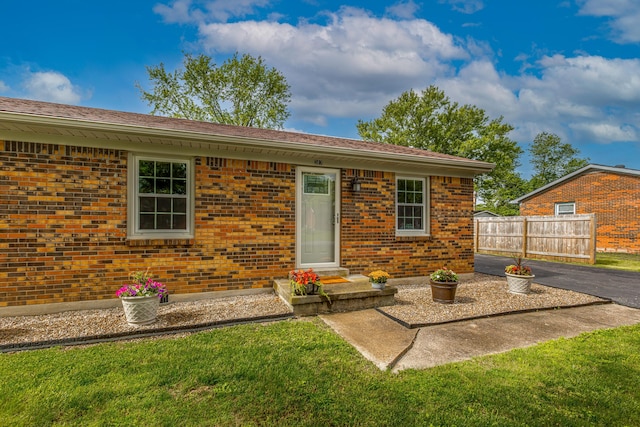 387 W Ila Ave, Danville, KY 40422 - back of property with brick siding and a patio area