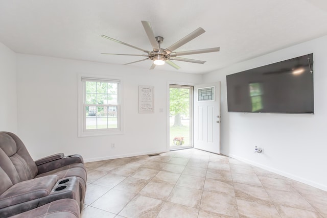387 W Ila Ave, Danville, KY 40422 - living area featuring ceiling fan, light tile patterned floors, and baseboards