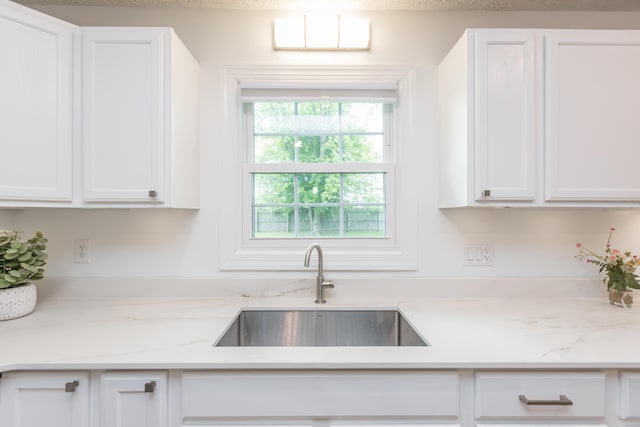 387 W Ila Ave, Danville, KY 40422 - kitchen featuring a sink, white cabinets, and light stone counters