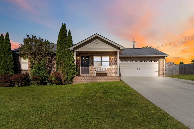 35 Prewitt Place Dr, Somerset, KY 42503 - view of front of house with brick siding, concrete driveway, and a garage