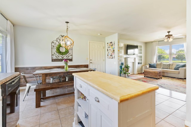 35 Prewitt Place Dr, Somerset, KY 42503 - kitchen with dishwasher, light tile patterned flooring, open floor plan, and healthy amount of natural light