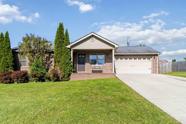 35 Prewitt Place Dr, Somerset, KY 42503 - view of front facade with brick siding, driveway, and a garage