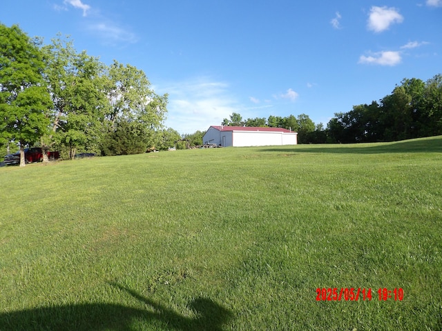 157 Deskins Ln, Frenchburg, KY 40322 - view of grassy yard with an outbuilding