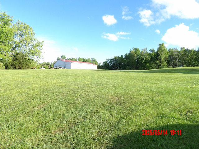 157 Deskins Ln, Frenchburg, KY 40322 - view of grassy yard featuring an outbuilding