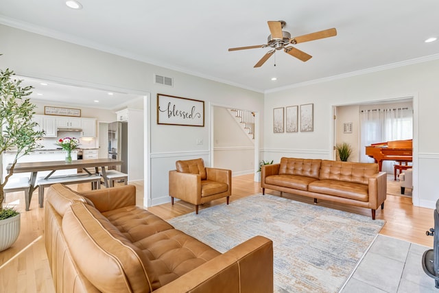 9118 Harrodsburg Rd, Wilmore, KY 40390 - living room with crown molding, a ceiling fan, stairs, recessed lighting, and light wood finished floors