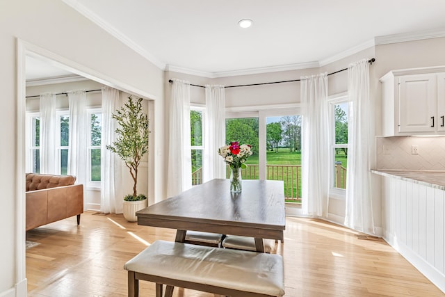 9118 Harrodsburg Rd, Wilmore, KY 40390 - dining space featuring crown molding, light wood-style flooring, and recessed lighting