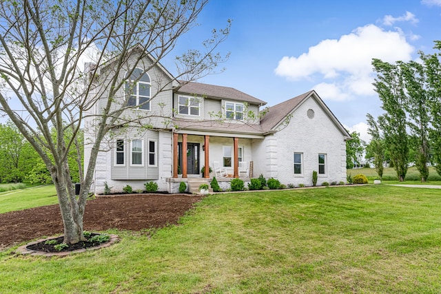 9118 Harrodsburg Rd, Wilmore, KY 40390 - view of front of house with a porch and a front yard