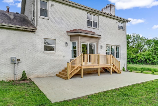9118 Harrodsburg Rd, Wilmore, KY 40390 - back of house with a chimney, a patio area, and a yard