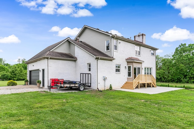 9118 Harrodsburg Rd, Wilmore, KY 40390 - rear view of house featuring a chimney, an attached garage, a yard, brick siding, and driveway