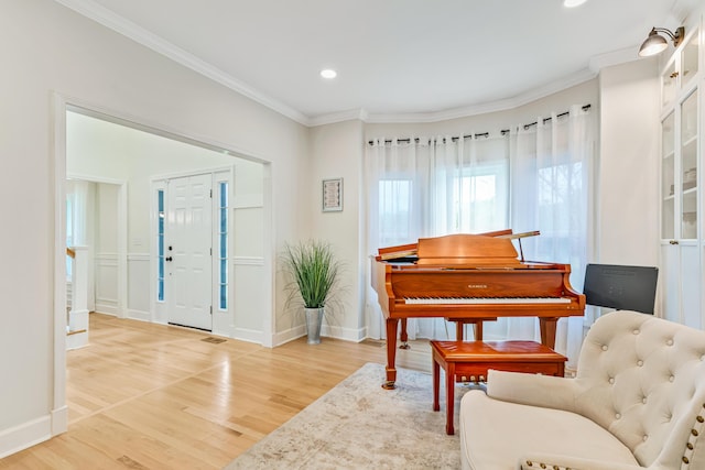 9118 Harrodsburg Rd, Wilmore, KY 40390 - living area featuring light wood-type flooring, crown molding, recessed lighting, and baseboards