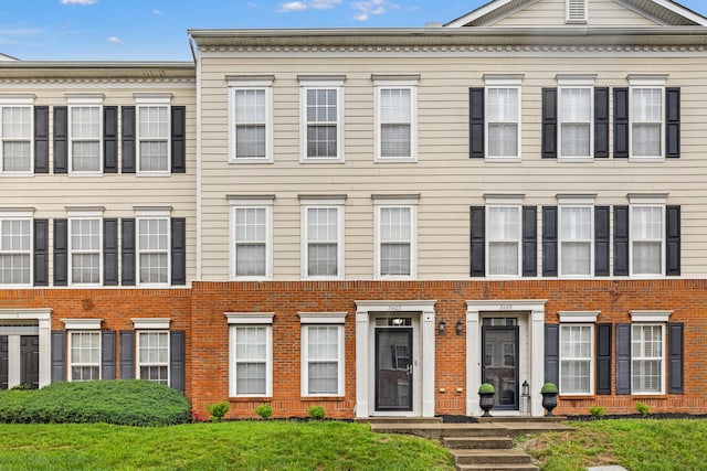 2607 Calgary, Lexington, KY 40509 - townhome / multi-family property with brick siding