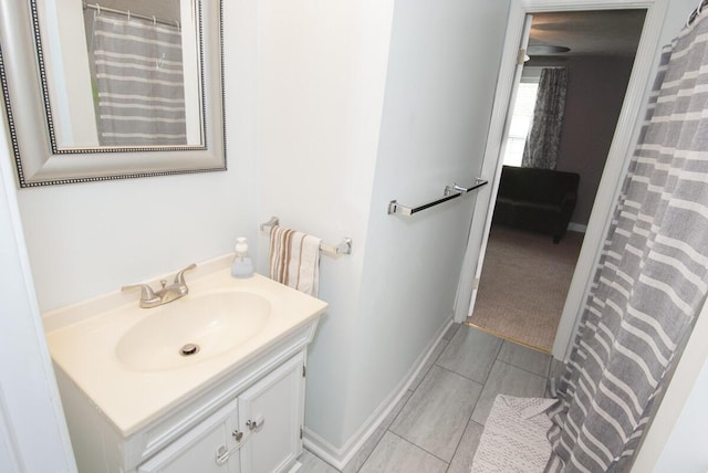 204 S Walnut St, Wilmore, KY 40390 - full bathroom featuring vanity and baseboards