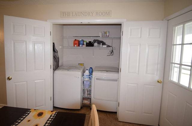 washroom with washing machine and dryer