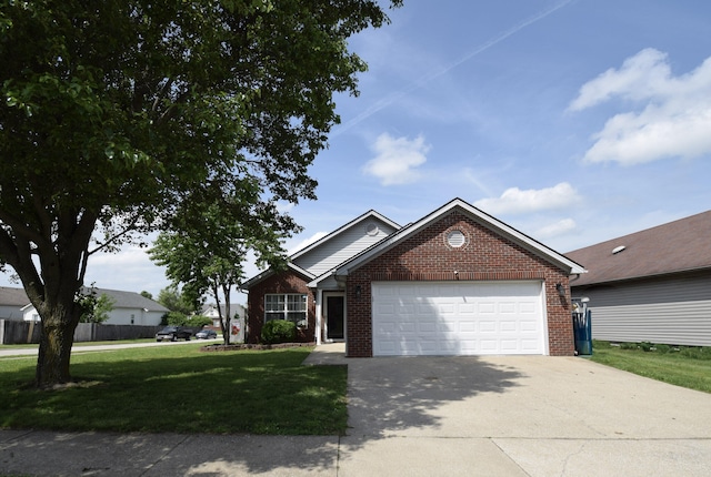view of front of house featuring brick siding, a garage, a front lawn, and concrete driveway
