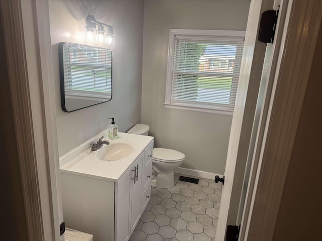 780 Nancy St, Versailles, KY 40383 - half bath featuring tile patterned flooring, vanity, toilet, and baseboards