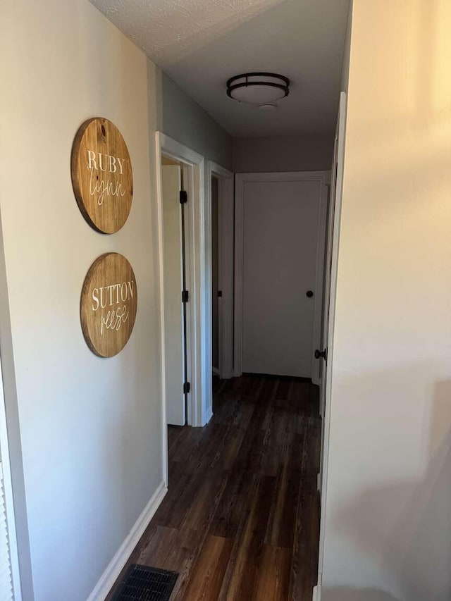 780 Nancy St, Versailles, KY 40383 - hall with dark wood-style floors and baseboards