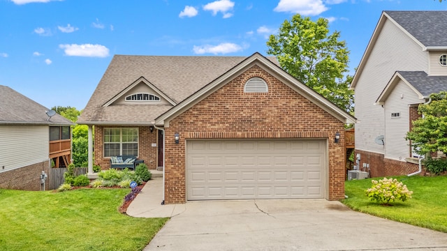 829 Lauderdale Dr, Lexington, KY 40515 - traditional-style home featuring brick siding, driveway, a shingled roof, and a front lawn