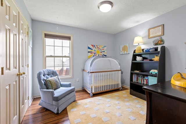 829 Lauderdale Dr, Lexington, KY 40515 - bedroom featuring wood finished floors and a textured ceiling