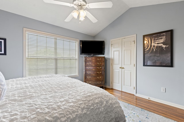 829 Lauderdale Dr, Lexington, KY 40515 - bedroom featuring wood finished floors, lofted ceiling, a ceiling fan, and a closet