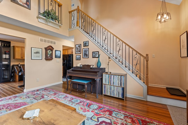 829 Lauderdale Dr, Lexington, KY 40515 - stairs with wood finished floors and a high ceiling