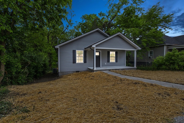 bungalow-style home featuring covered porch and crawl space