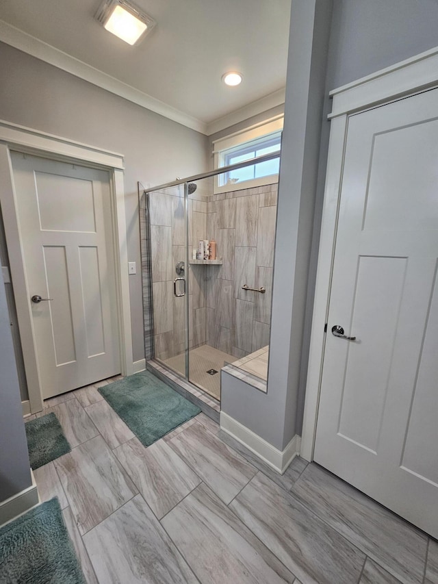 229 Old Station Rd, Frankfort, KY 40601 - bathroom featuring a shower stall, ornamental molding, and baseboards