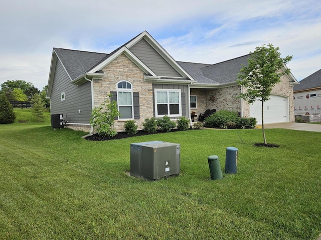 229 Old Station Rd, Frankfort, KY 40601 - view of front of house with concrete driveway, a front lawn, a shingled roof, and an attached garage