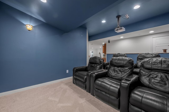 carpeted cinema room featuring recessed lighting and baseboards