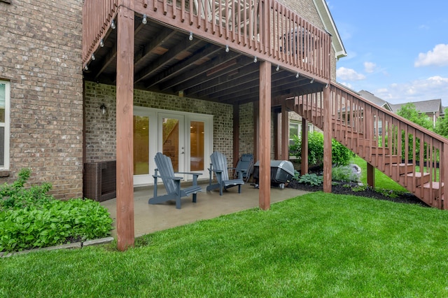 view of patio / terrace with stairs and a wooden deck