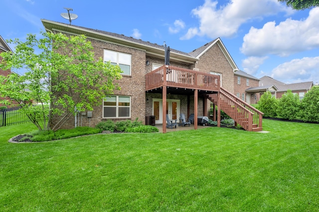 rear view of house featuring brick siding, a deck, stairway, a patio area, and central air condition unit